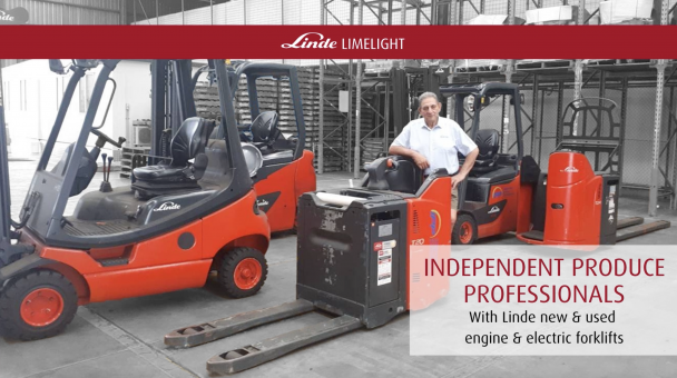 Owner of Independent Produce Professionals standing with his Linde forklifts
